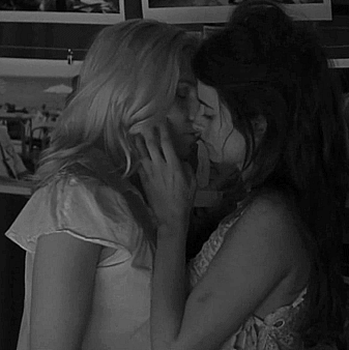 Black and white threesome kissing gif